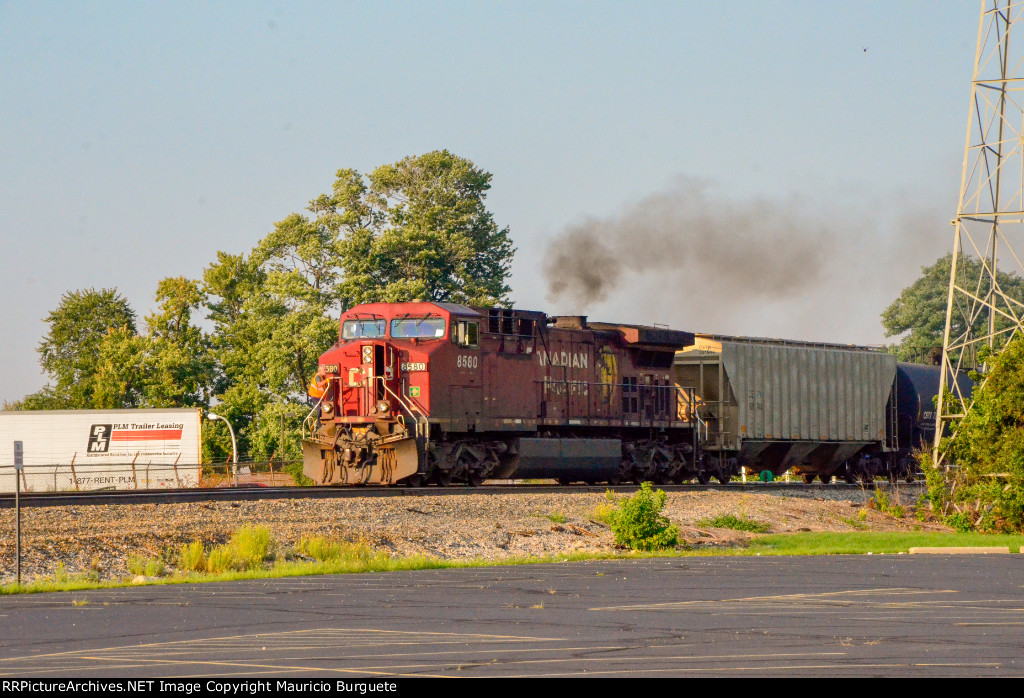 CP AC44CW Locomotive leading a train